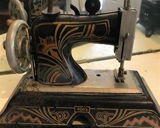 Child’s tin sewing machine