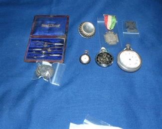 drafting set, watches: American Waltham railroad pocket watch, Girard Perregaux skeleton pocket watch, small lady's pocket watch. english soccer medal.