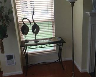 Cool bird sculpture, wood and glass table with great floor lamp