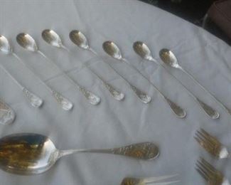 Tiffany & Co Sterling set for 8 in the Audubon Pattern: 8 each of dinner forks; lunch forks; salad forks; soup spoons; teaspoons; dinner knives; steak knives; iced tea spoons; and one meat fork and serving spoon.