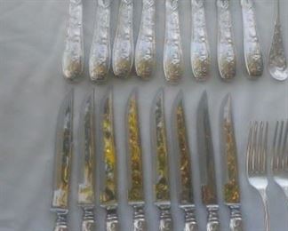 Tiffany & Co Sterling set for 8 in the Audubon Pattern: 8 each of dinner forks; lunch forks; salad forks; soup spoons; teaspoons; dinner knives; steak knives; iced tea spoons; and one meat fork and serving spoon.