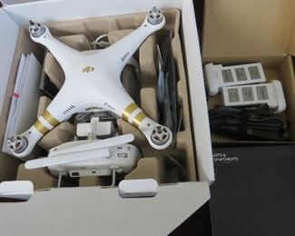 Phantom 3 Professional Drone. Complete with camera, control, additional chargers and additional parts. 
