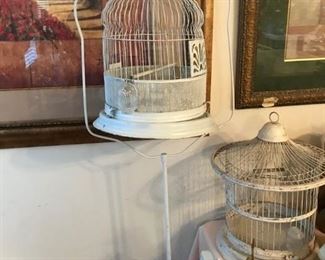 Iron stand with vintage bird cage