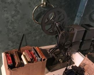 16mm Projector and films, including Mickey Mouse, Woody Woodpecker and Three Stooges