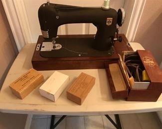 Montgomery Ward sewing Machine with case and accessories from the 1940's.