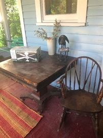 table, ceiling fan and spindle chair