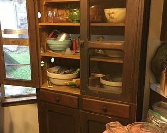 One of two Texas pie safes along with primitives, earthenware and early kitchen implements
