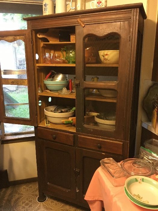 One of two Texas pie safes along with primitives, earthenware and early kitchen implements