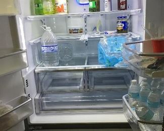 Stainless Steel 2018 Kenmore Elite refrigerator with bottom freezer