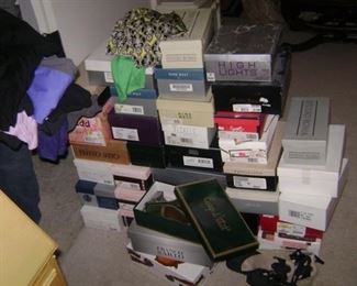 ONE OF MANY PILES OF HER SHOE COLLECTION