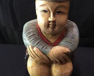 Thai sitting man figurine