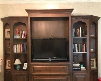 Custom made walnut entertainment center and 2 (separate) bookcases by Savage Cabinet Co.