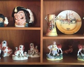 Large Royal Doulton "Capt. Henry Morgan" jug, Capt, Ahab jug, Staffordshire dog & cow figurines (note puppies!), Royal Doulton Bobbie Burns vases & plate with coach scene