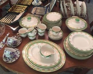 Set of vintage English dishes with green & gold design, cups & saucers with violets