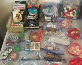 More fishing tackle: line, spoons, fly tying supplies including hooks, feathers, chenille & more