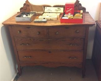 Antique oak dresser + tobacco tins