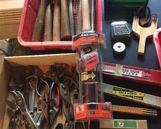 Hand tools galore: many hammers, pliers, wrenches, file sets, tape measures