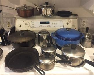 Cast iron skillets & Dutch oven, copper sauce pan, Revere Ware pans & coffee pot, Lodge blue enamel pot