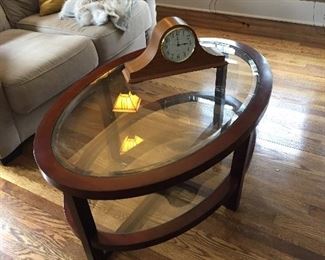 Seth Thomas mantle clock; and, oval glass-topped coffee table