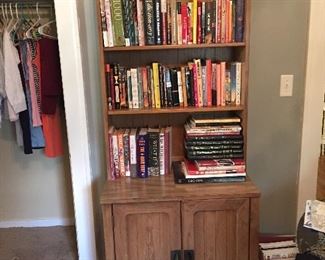Step back cupboard; assorted books; children’s clothes