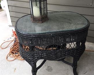 Wicker side table and decorative lantern
