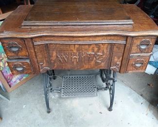 Turn of the Century White Treadle Sewing Machine with oak cabinet