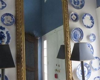 ANTIQUE FRENCH ROCOCO GILT MIRROR.  Surrounded by a selection of flow blue earthenware / porcelain plates