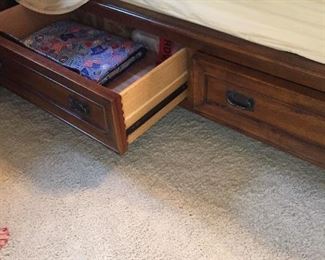 Storage drawers of bed