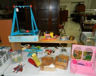 Barbie, Superman, dollhouse furniture