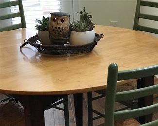 Small kitchen oak table with 4 matching Cain chairs. Great condition. 