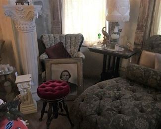 So many cool finds in this section of the home. Vintage fainting sofa, Gorgeous piano stool, large Antique charcoal portraits, vintage wing back chairs, Pedestals, and more