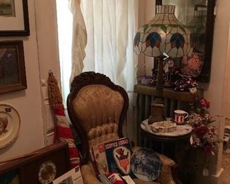 In this picture is a man's Victorian parlor chair, Capiz shade lamp, and so many more treasures
