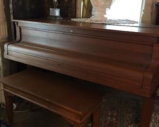 1900 Grand Prix  Baby Grand piano . Was purchased by a father for his daughter when she was a little girl. This piano had won several awards including an award at the 1904 ST Louis World Fair. My client bought later from lady and has owned it since. Taken several pictures for your convivence.