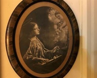 Antique picture of St. Cecilia playing piano with cherubs looking on