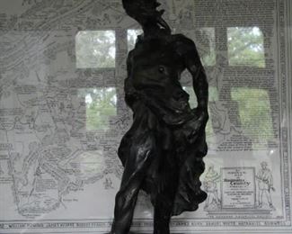 Bronze faceless man