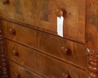 Another hand crafted piece. Notice how burled walnut was used in the center of the drawers.