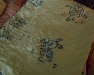 Several quilts and blankets