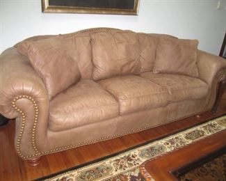 LEATHER SOFA AND MATCHING CHAIR AND OTTOMAN