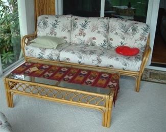 Rattan couch and coffee table.