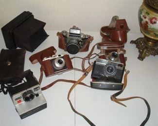 Collection antique cameras including, Regula, Exakta, Paxette, Optima, Koilos and others not shown.