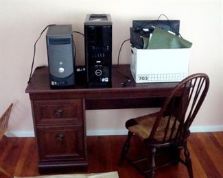 Desk, chair, & two Dell desk top computers.