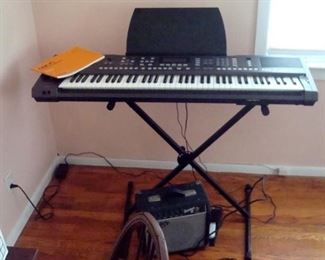 Roland EXR-7s syn. keyboard with fender amp, stand, and case.