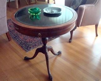 Vintage round leather top pedestal table.