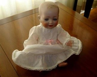 Antique Character doll. Probably Kestner. Open mouth with two teeth and open close eyes, composition body.