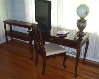 HDTV. , antique GWTW lamp with original base & shade, electrified. Queen Anne desk/table and vintage leather top sofa table.