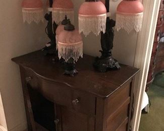 Victorian Style lamps. Wash Stand has mirror.