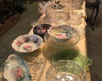 Prussia Bowls and Platters, Cut Crystal. Lots of Glass serving pieces, Cake Plates. (Check under the table also).