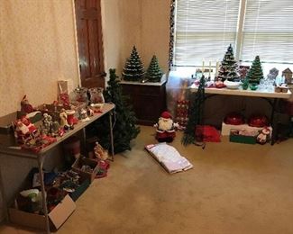 Ceramic Christmas Trees. Large artificial trees not shown in photo.