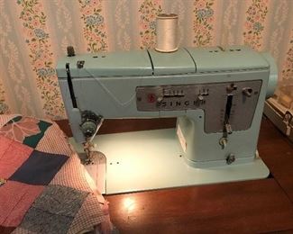 Singer Sewing Machine in cabinet