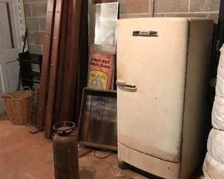 Hotpoint Refrigerator still works. Antique fire extinguisher